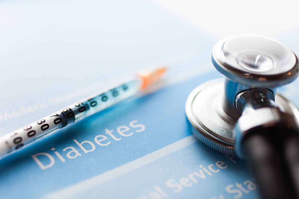 Stethoscope,And,A,Syringe,On,A,Diabetes,Test